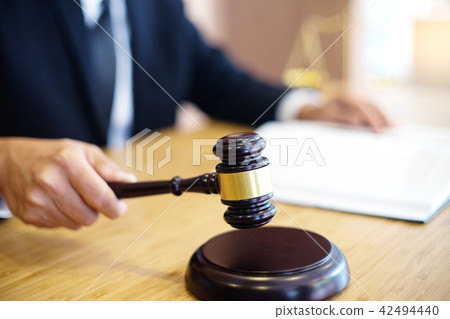 lawyer or judge work in the office with gavel lawyer or judge work in the office with gavel 42494440
