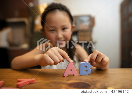 Studying the alphabet 42496142