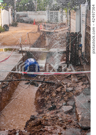 tap water fountain leaking from pipeline. 42497364