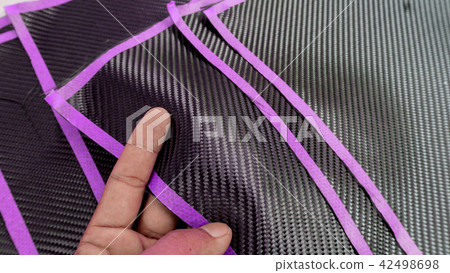 Black carbon fiber composite material background Black carbon fiber composite material background 42498698