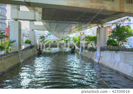 Nakamuragawa River flowing under Yokohama Capital High Speed Elevation Nakamuragawa River flowing under Yokohama Capital High Speed Elevation 42500016