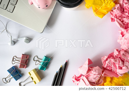 office accessories and crumbled paper ball on office accessories and crumbled paper ball on 42500712