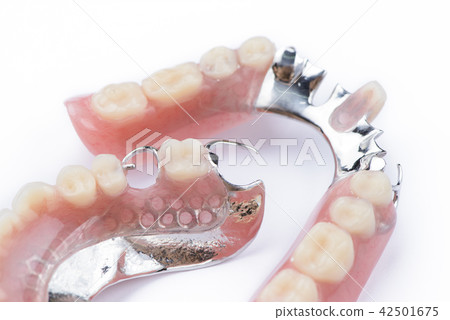 Partial denture upper side on a white background Partial denture upper side on a white background 42501675