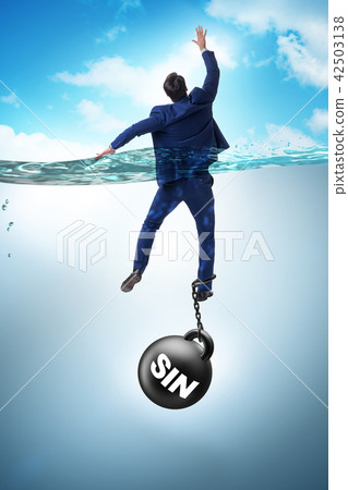 Businessman drowning under the burden of sin and guilt 42503138