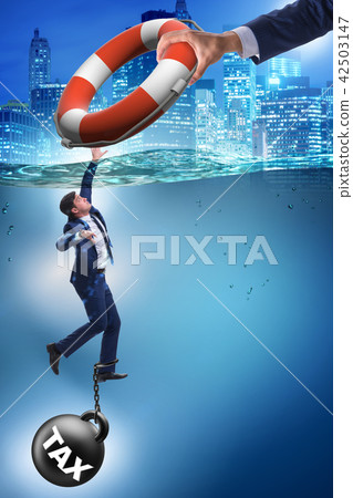 Businessman being saved from high taxes Businessman being saved from high taxes 42503147