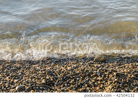 pebbles on the beach pebbles on the sea shore and pebbles on the beach pebbles on the sea shore and 42504132