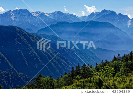 Kenjima mountain range mountain view from the Kagoshima Yagatake mountain ridge line in the afternoon 42504389
