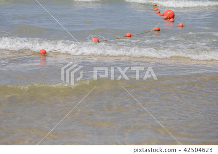 Red buoys in the open sea on a sunny day. Red buoys in the open sea on a sunny day. 42504623