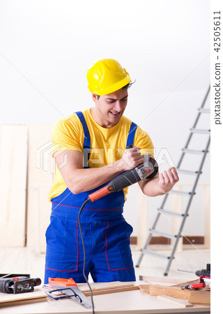 Floor repairman disappointed with his work Floor repairman disappointed with his work 42505611