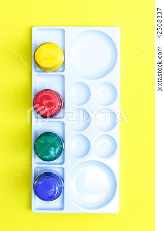 Colour water on yellow  background 42508337