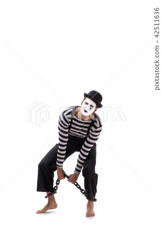 Mime with his feet chained isolated on white 42511636