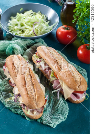 Submarine sandwiches with ham and other Submarine sandwiches with ham and other 42515596