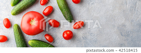 Fresh tomatoes, cucumbers and green onions Fresh tomatoes, cucumbers and green onions 42518415