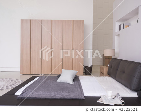 Bedroom with bed and wardrobe interior Bedroom with bed and wardrobe interior 42522521