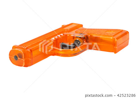 Orange plastic water pistol isolated  42523286