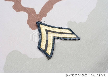 US ARMY Corporal rank patch on desert uniform 42523721