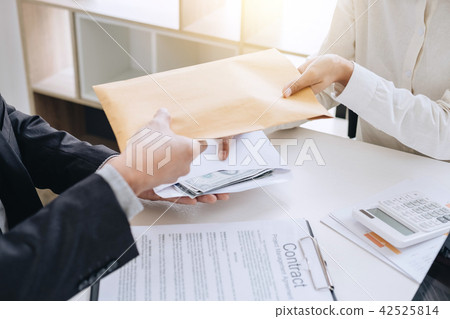Bribery and corruption concept, bribe in the form of dollar bill 42525814