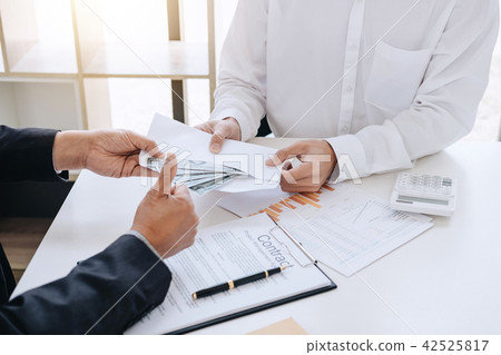 Bribery and corruption concept, bribe in the form of dollar bill 42525817