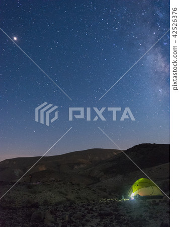 Tent under stars in desert vacation Tent under stars in desert vacation 42526376
