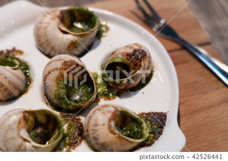Escargots Snails with garlic herbs butter Escargots Snails with garlic herbs butter 42526441