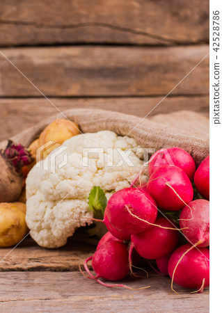 Cauliflower and radishes. 42528786