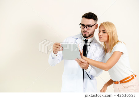 Male Doctor and Female Patient in Hospital. 42530555