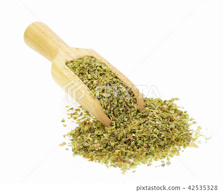 Oregano spice in spoon on white background 42535328