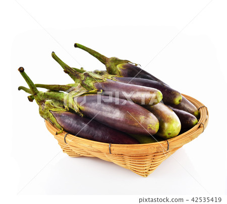 Eggplant in basket on white background Eggplant in basket on white background 42535419
