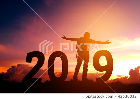 Silhouette young man happy to 2019 new year 42536032