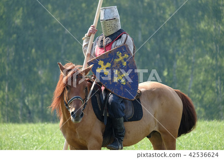 medieval knight with a spear riding a horse medieval knight with a spear riding a horse 42536624