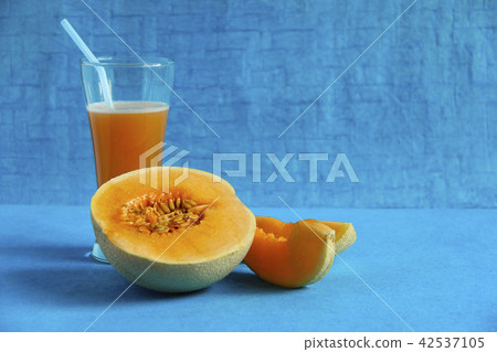 Muskmelon fruit and juice isolated on background Muskmelon fruit and juice isolated on background 42537105