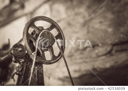 Flywheel of an old retro  sewing machine 42538039