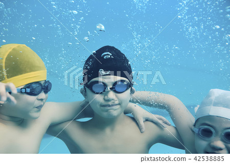 Children enjoy swimming 42538885