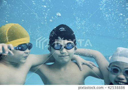 Children enjoy swimming Children enjoy swimming 42538886