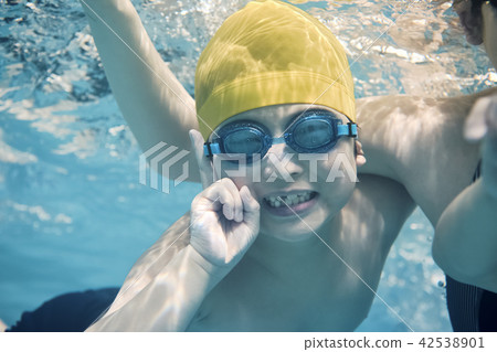 Children enjoy swimming 42538901