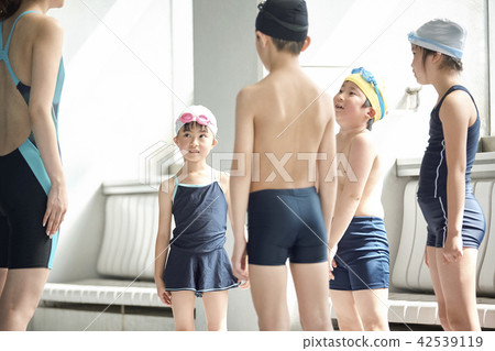 Swimming coach and children Swimming coach and children 42539119