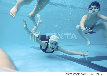 Children enjoy swimming Children enjoy swimming 42539120