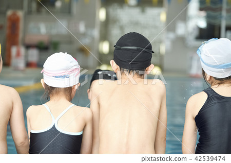 Swimming coach and children - Stock 