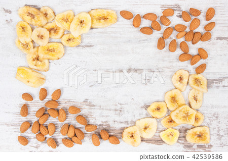 Banana chips and almonds as source vitamins 42539586