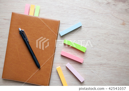 Sticky note and notebook image Sticky note and notebook image 42541037