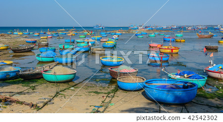 Wooden boats at fishing pier Wooden boats at fishing pier 42542302