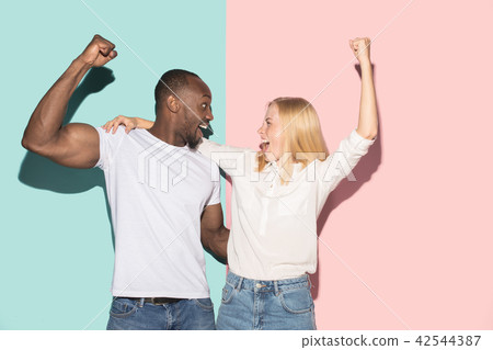 We won. Winning success happy afro man and woman celebrating being a winner. Dynamic image of 42544387