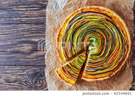 vegetable Spiral quiche on a paper 42544691