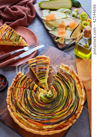 sliced Spiral tart on a plate sliced Spiral tart on a plate 42544698