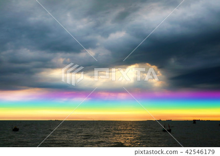 rainbow back dark cloud on sea. concept god bless rainbow back dark cloud on sea. concept god bless 42546179