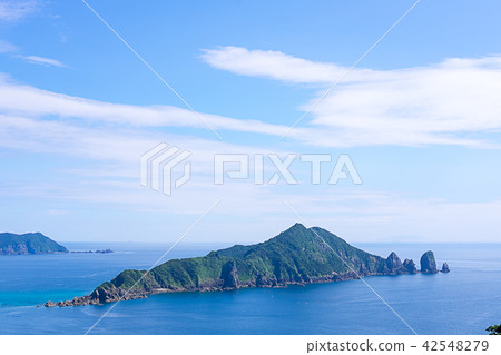 An island like the monster's back and the blue sea An island like the monster's back and the blue sea 42548279