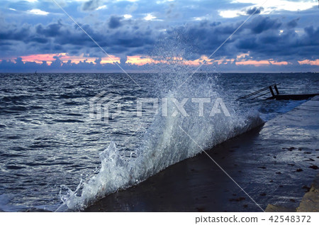Splashing wave on the Black sea. 42548372