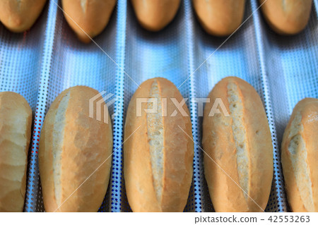 Fresh bread on shelf. buns from the oven. Fresh bread on shelf. buns from the oven. 42553263