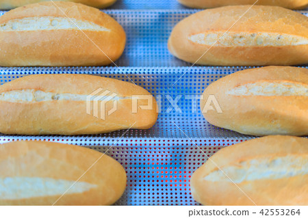 Fresh bread on shelf. buns from the oven. Fresh bread on shelf. buns from the oven. 42553264