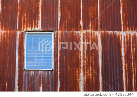 Old style window with Rusty corrugated iron metal Old style window with Rusty corrugated iron metal 42553344